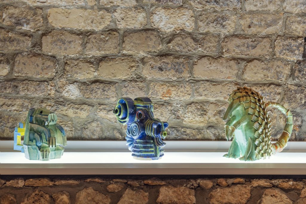 3 céramiques de couleurs vertes et bleues représantant des animaux.
