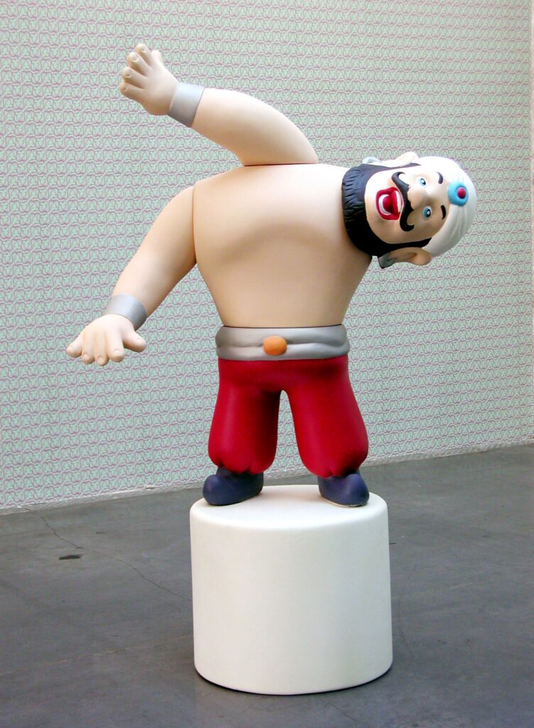 Sculpture rigolote d'un contorsionniste